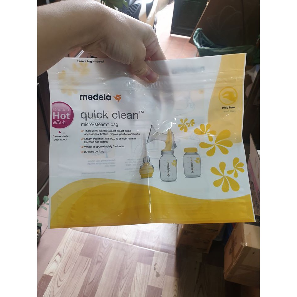 cốc hứng sữa mama's choice ( tặng túi tiệt trùng medela )