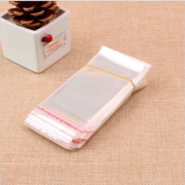 1 lạng túi dán đựng phụ kiện có móc treo size 10x20+4 mép