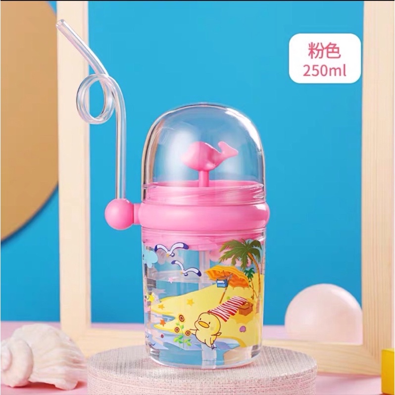Bình dụ bé uống sữa hình cá heo phun nước