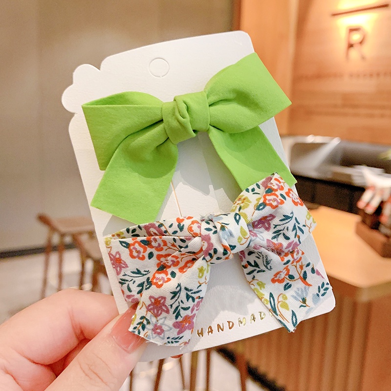 Kẹp tóc hình nơ họa tiết hoa dễ thương phong cách Hàn Quốc cho nữ