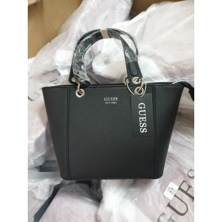 Túi cầm tay guess