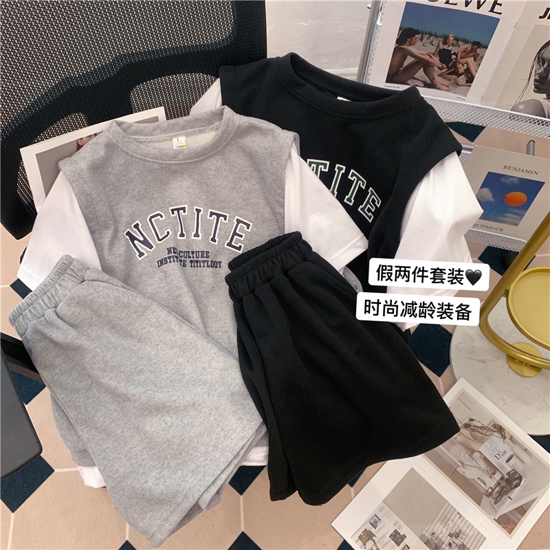 Set trang phục SUXI áo thun tay ngắn giả hai lớp và quần đùi lưng cao phong cách thể thao năng động dành cho nữ