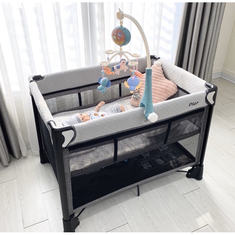 Đồ chơi treo nôi cũi tự xoay 360 độ phát nhạc ru ngủ cho bé