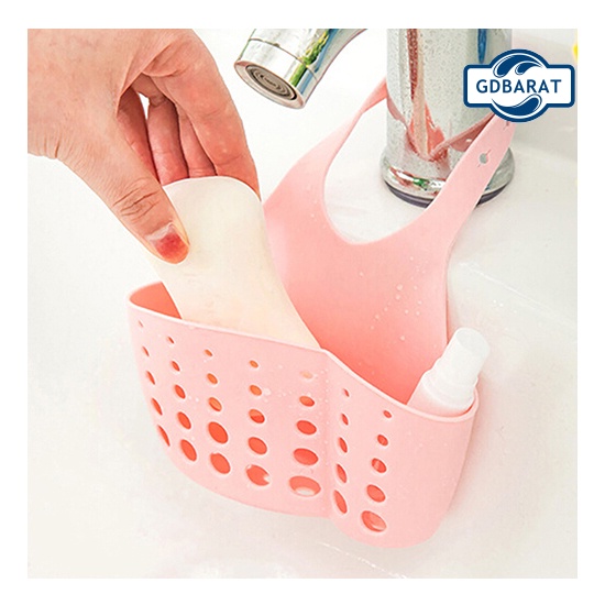 Giỏ đựng miếng xốp rửa chén có hai ngăn đục lỗ thoát nước giúp sắp xếp gọn gàng cho bồn rửa chén