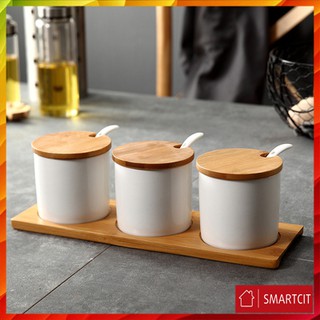 BỘ ĐỰNG GIA VỊ GỐM SỨ 3 HŨ GIÁ ĐỠ GỖ CAO CẤP T3A3