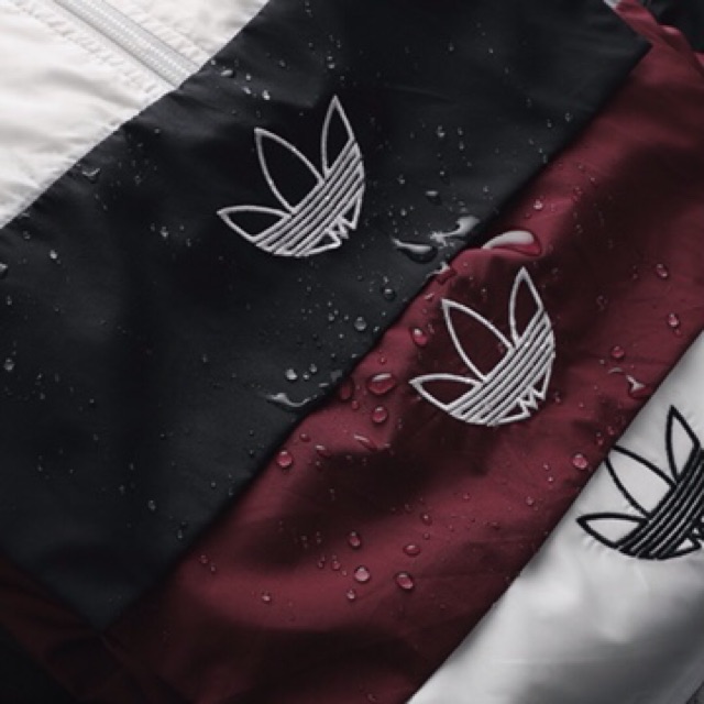 Áo khoác gió dù Das originals jacket logo