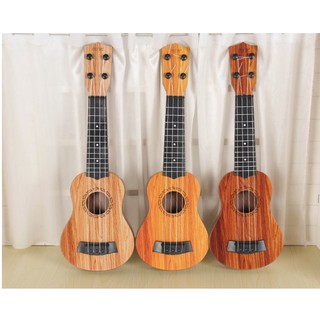 DGT11 - Đồ chơi đàn ghita Ukulele 4 dây xịn xò tặng kèm thêm dây cho bé