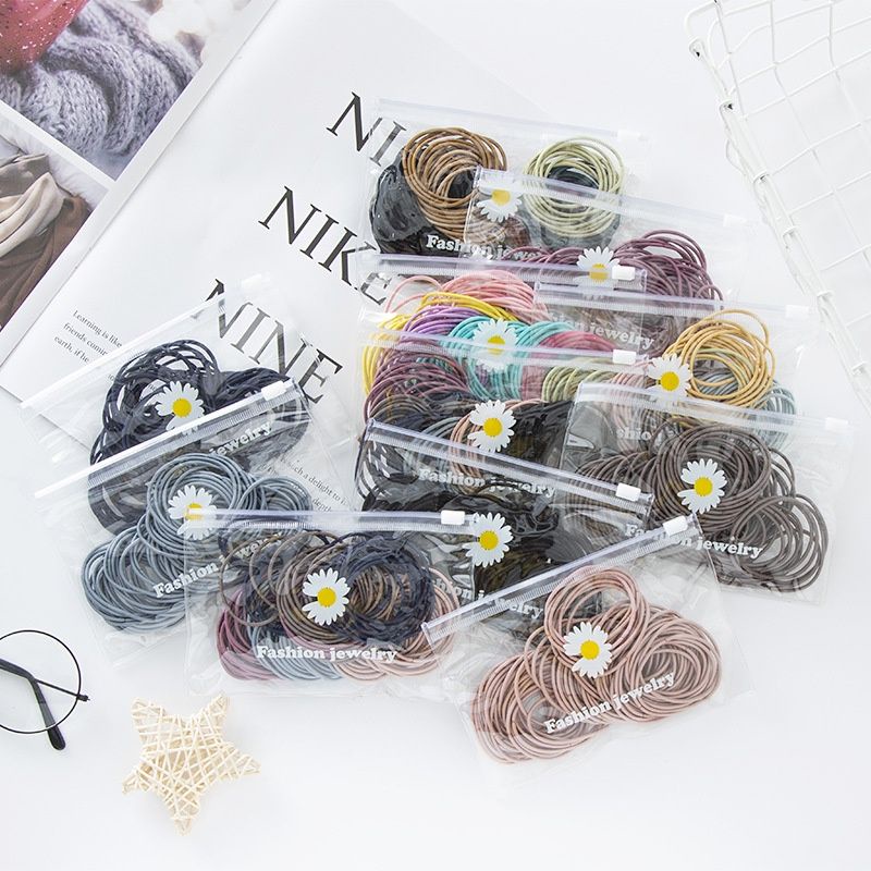 Set 100 Dây Buộc Tóc Mix Nhiều Màu Siêu Xinh Kèm Túi Zip Hoa Cúc Trong Suốt