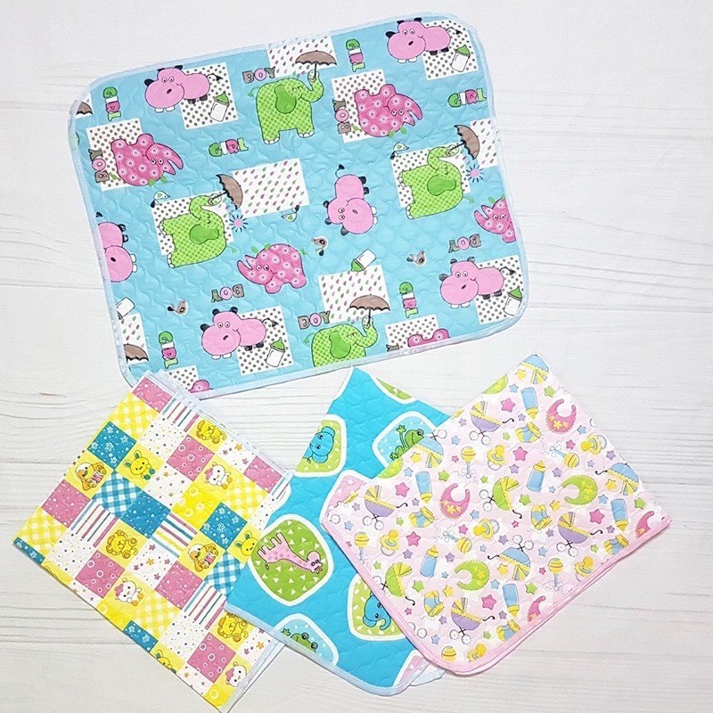 Chiếu lót thay đồ cho bé sơ sinh. Tấm lót miếng lót nhựa nilon chống thấm dùng thay tã bỉm cho trẻ - Sỉ