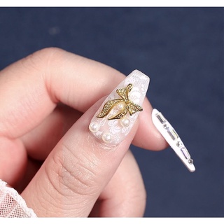 Charm nơ kim loại gắn móng tay ( giá 1 chiếc)
