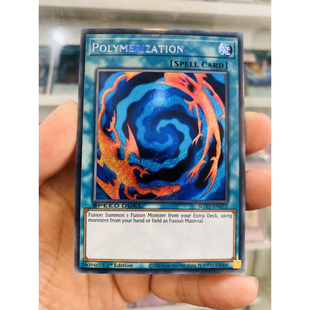 Thẻ Bài YugiOh! Mã SGX1-ENA12 - Polymerization - Secret Rare - 1st Edition