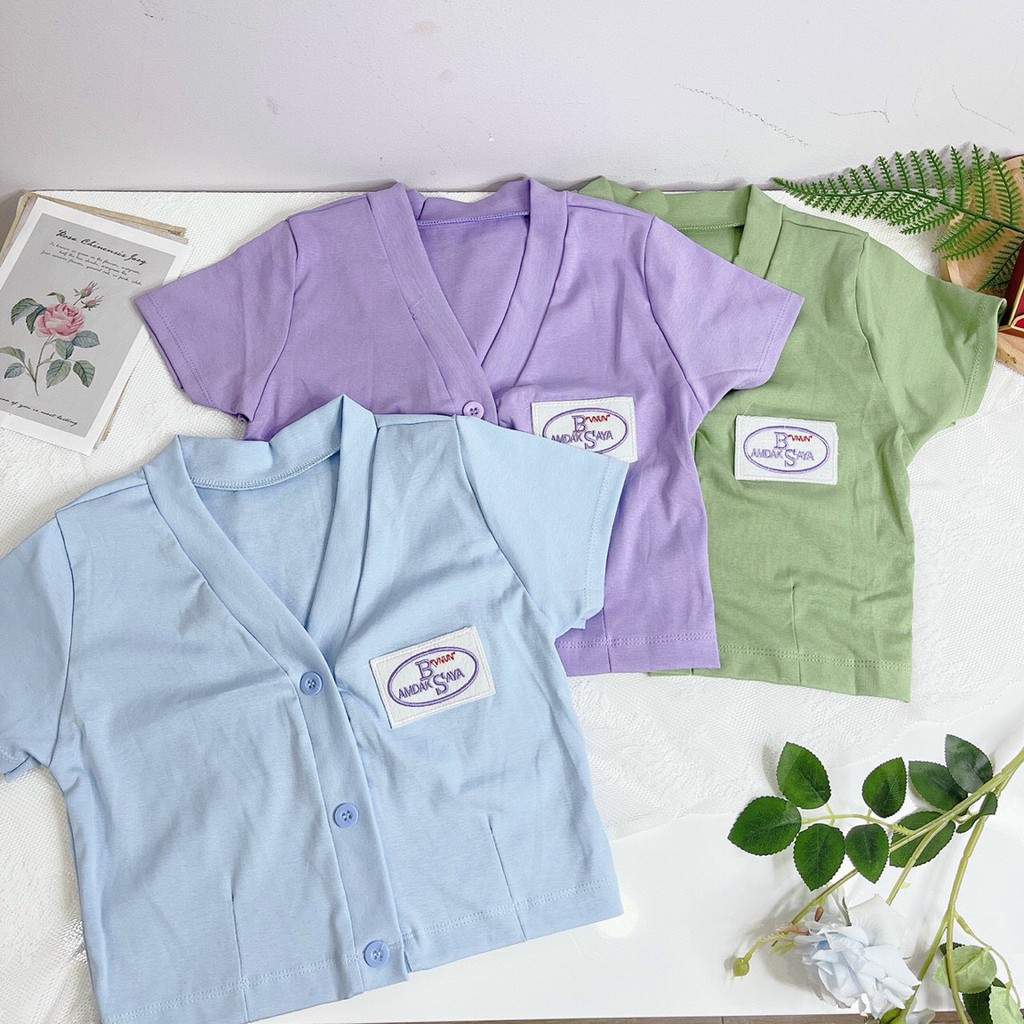 áo croptop cô tim cài nút thêu logo xinh
