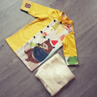 Áo dài vàng gấu