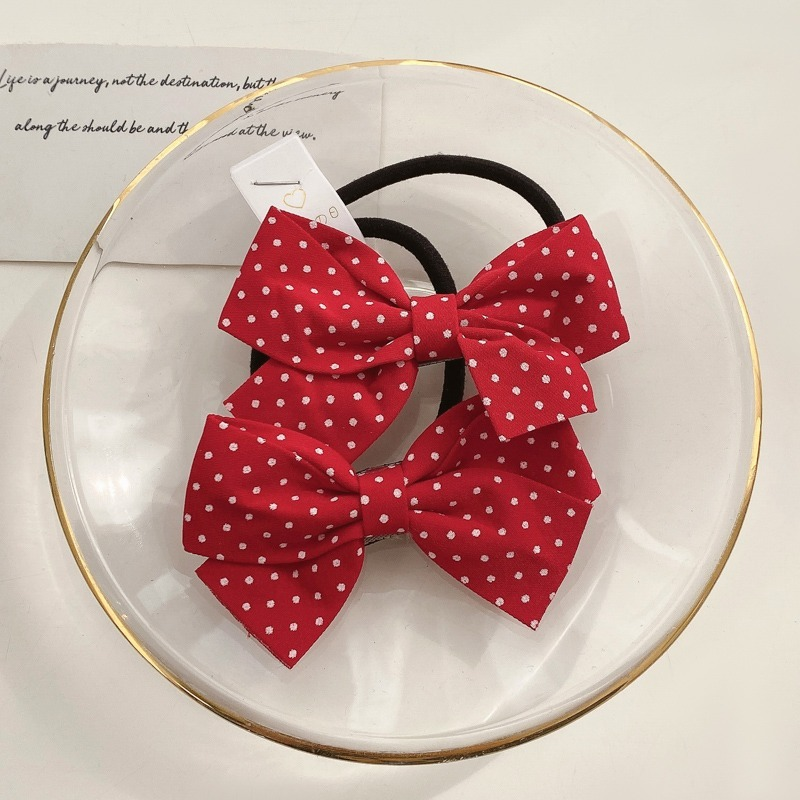 Thun cột tóc gắn nơ dễ thương phong cách Hàn Quốc