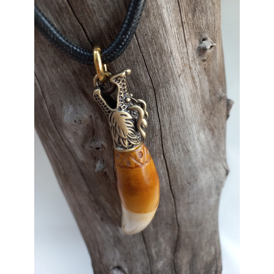 Mặt dây nanh báo nhân tạo đầu rồng