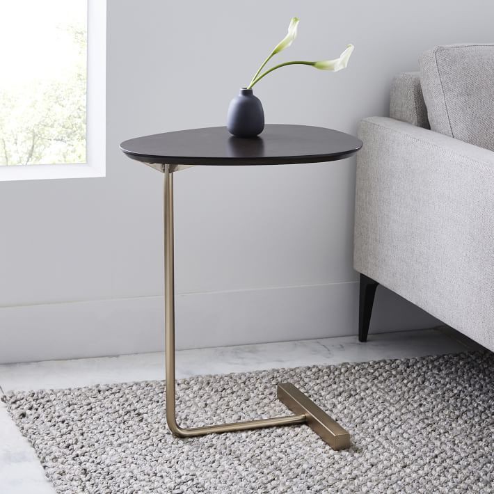 Ghế sofa hình bầu dục bằng sắt rèn sáng tạo với một vài góc và bàn đọc sách đầu giường lười gỗ đơn giản có thể tháo rời