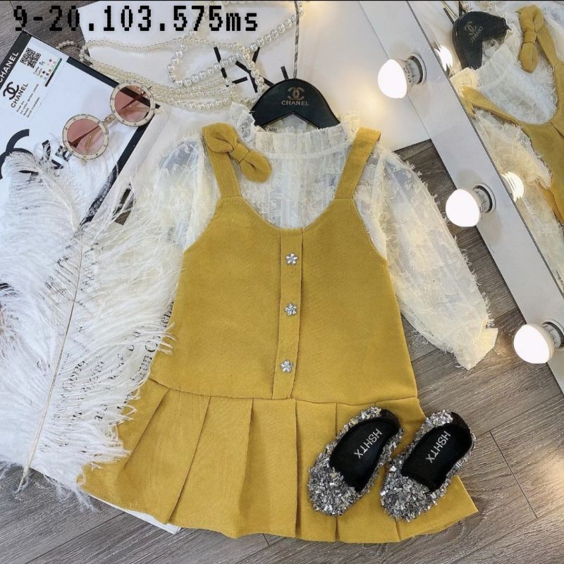 Váy đuôi cá 3 cúc. Chất nhung kết hợp áo voan. Sz 9-20kg. Chất voan của áo y hình váy vàng
