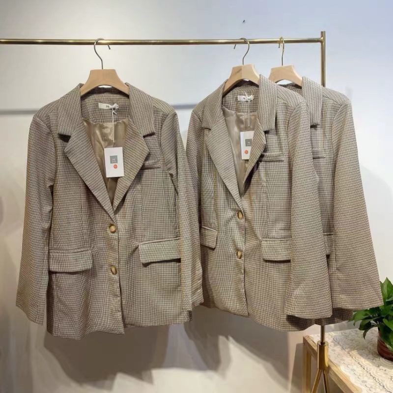 Áo vest kẻ nắp túi