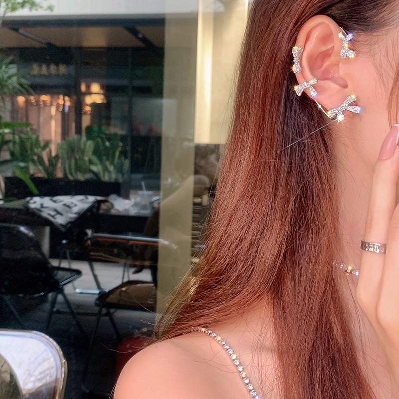 Khuyên Tai Nơ Tua Rua Không Xỏ Lỗ