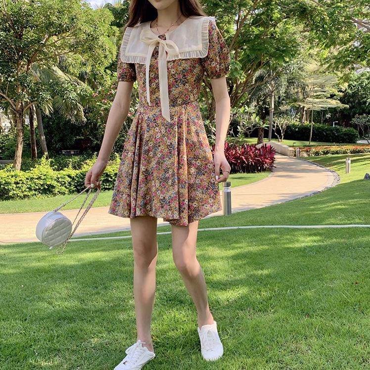 Váy hoa nhí cổ nơ bèo Quảng Châu -TikBook Store