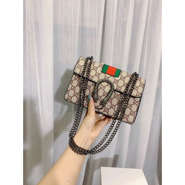 Tui xách nữ đeo chéo hoạ tiết đầu rồng