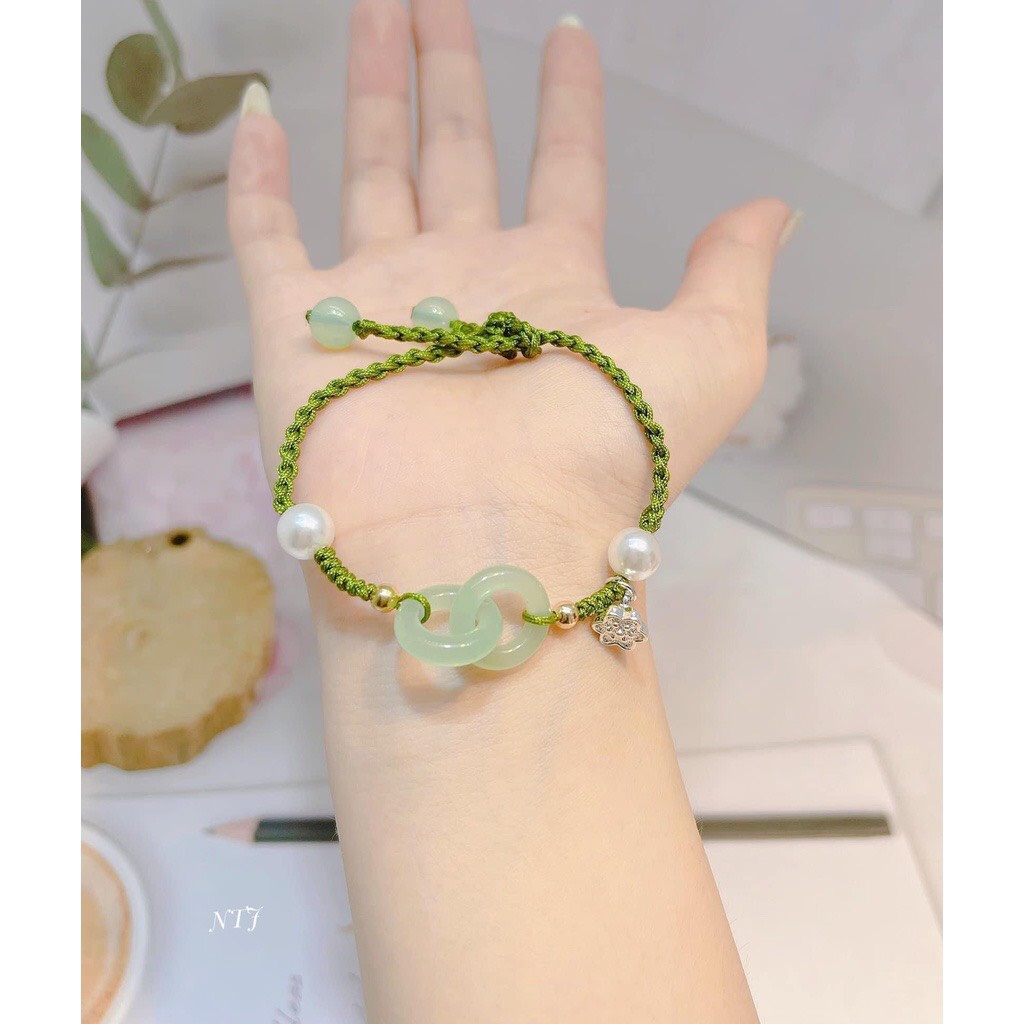 Vòng tay nữ bện dây đính hạt trai phong cách cổ điển biểu tượng tình yêu vĩnh cửu - Kho sỉ bạc Nhất Linh