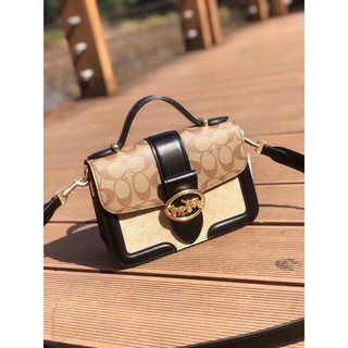 Túi Coach da thật pha canvas trần chỉ phối màu trẻ trung