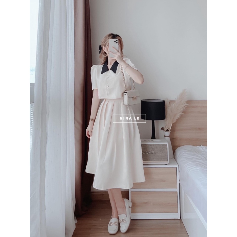 Sét bộ nữ áo vest croptop cúc ngọc tay bồng mix chân váy xếp ly dáng dài xòe nhẹ nhàng chất lien màu kem be sẵn fullsize