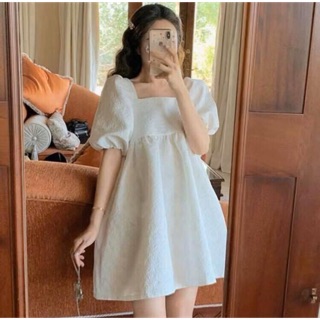 Đầm babydoll gấm trắng nơ lưng