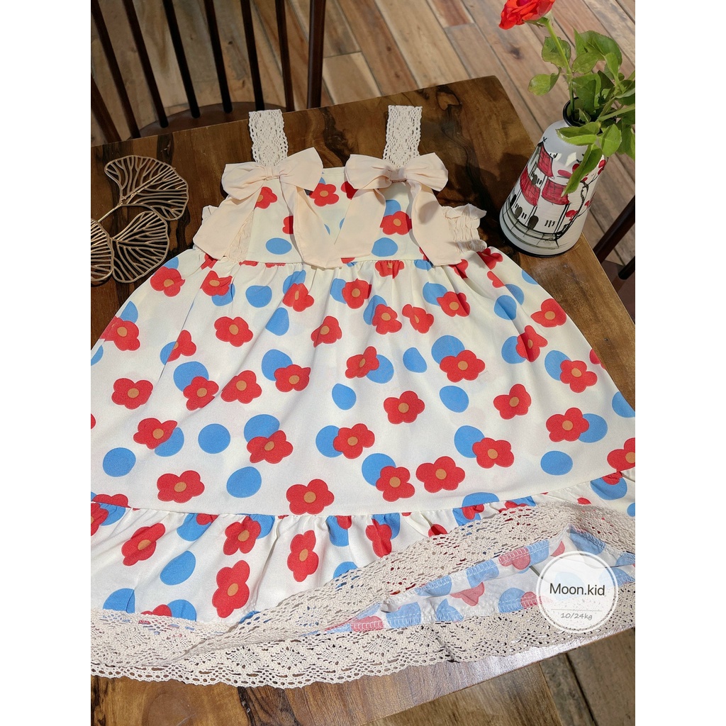 Váy hoa ren 2 dây đính nơ trước ngực bé gái 8-20kg
