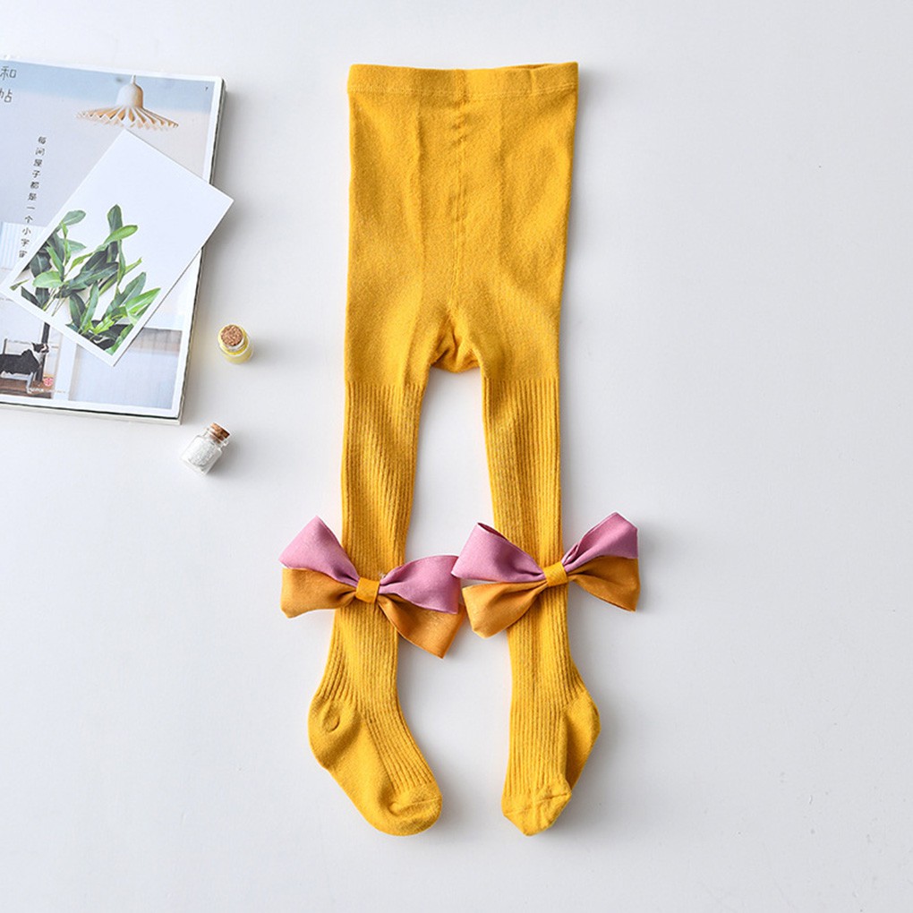Quần liền tất màu trơn phối nơ thắt dành cho bé gái sơ sinh