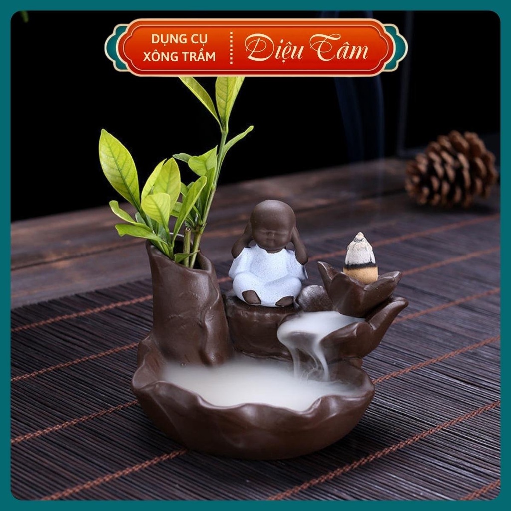 Tháp khói trầm hương hình chú tiểu, thác trầm hương đốt nụ trầm khói ngược thay cho lư đốt trầm Diệu Tâm