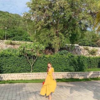 Đầm vàng midi cột nơ ngực ( ảnh thật )