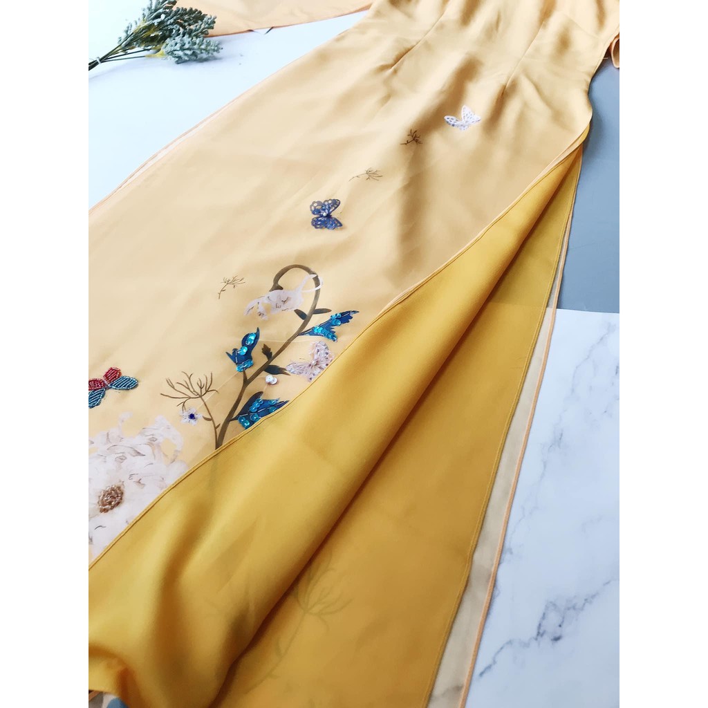 ÁO DÀI TRUYỀN THỐNG ĐÍNH CƯỜM MÀU VÀNG HOA CÚC CHẤT TƠ Ý 4 TÀ CAO CẤP | BigBuy360 - bigbuy360.vn