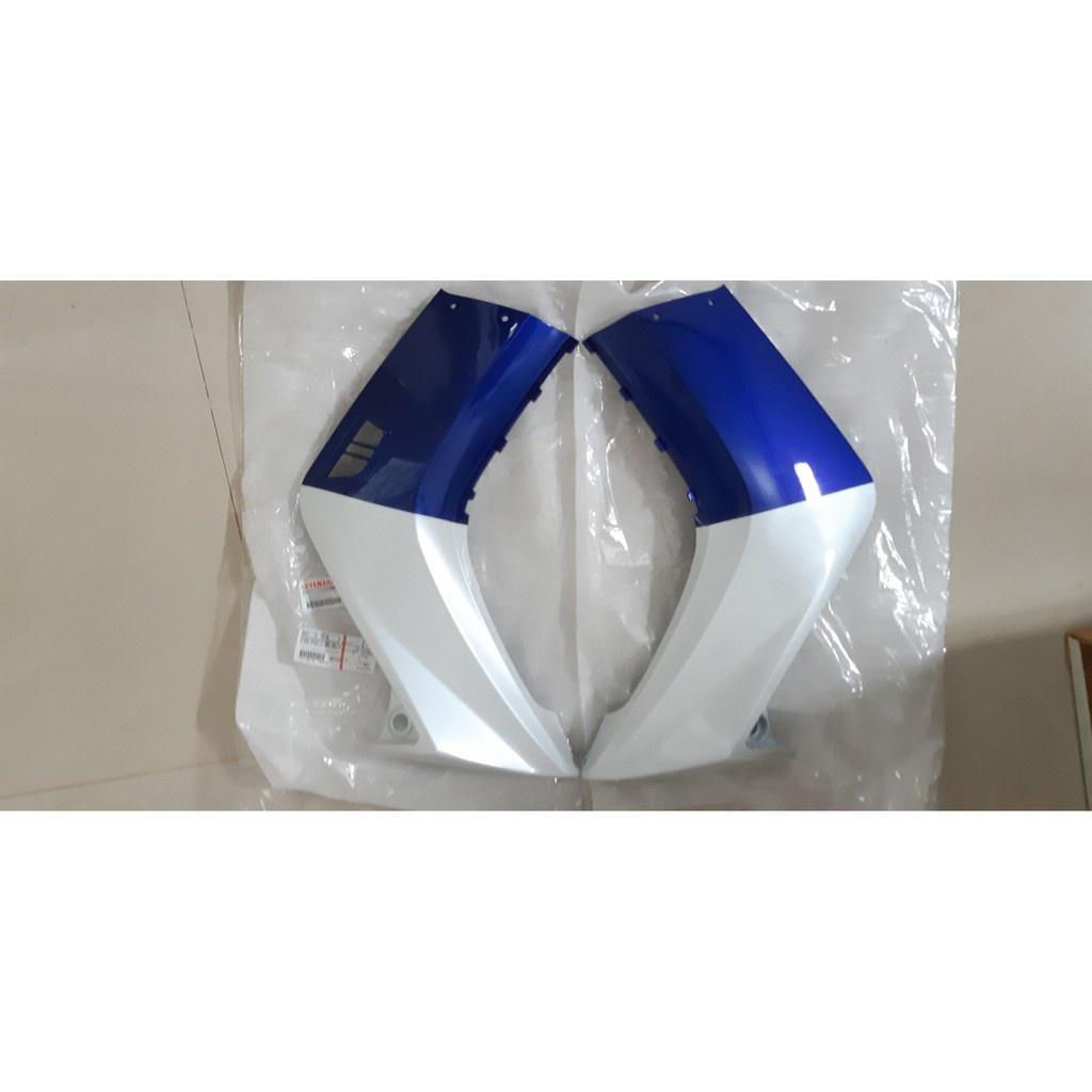 Cánh yếm ngoài zin Exciter 2006 - 2010 xanh GP/trắng