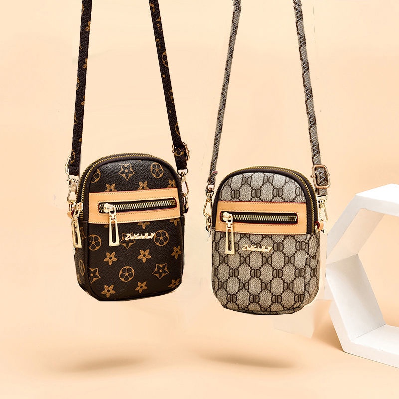 popular new small mobile phone bag Women's Mini Messenger bag fashion internet popular mobile phone bag mini all-match shoulder bag Women's Mini retro shell bag Women's Mini simple bucket bag women's dumpling bag women's postman b