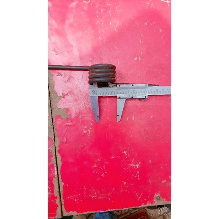 Lò xo máy cắt sắt