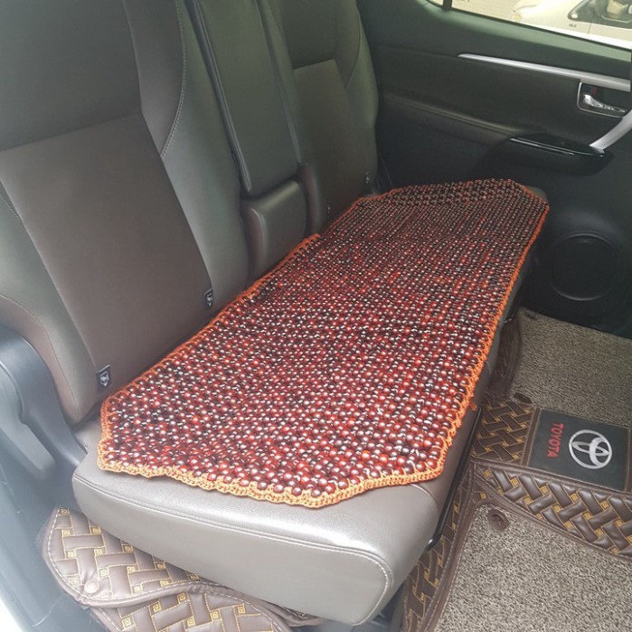 Sản Phẩm Đệm hạt gỗ tựa lưng massage ghế ô tô, kiêm dải lót hàng ghế sau 100% gỗ Cẩm Lai tự nhiên. Dạng đan kết diềm mép