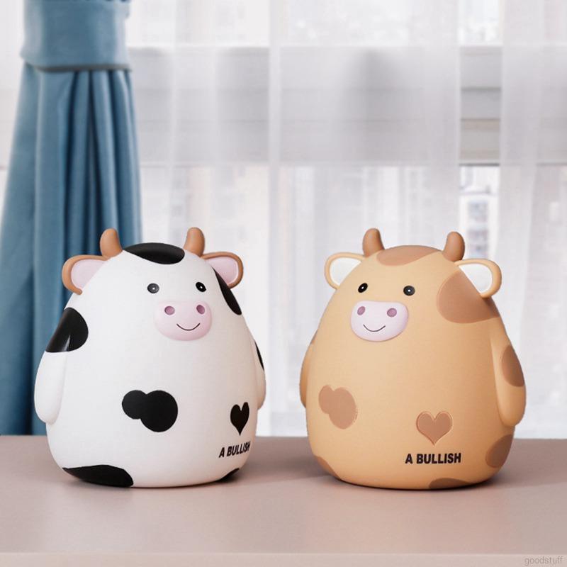 1 ống đựng tiền tiết kiệm hình bò vàng đáng yêu trang trí nhà cửa