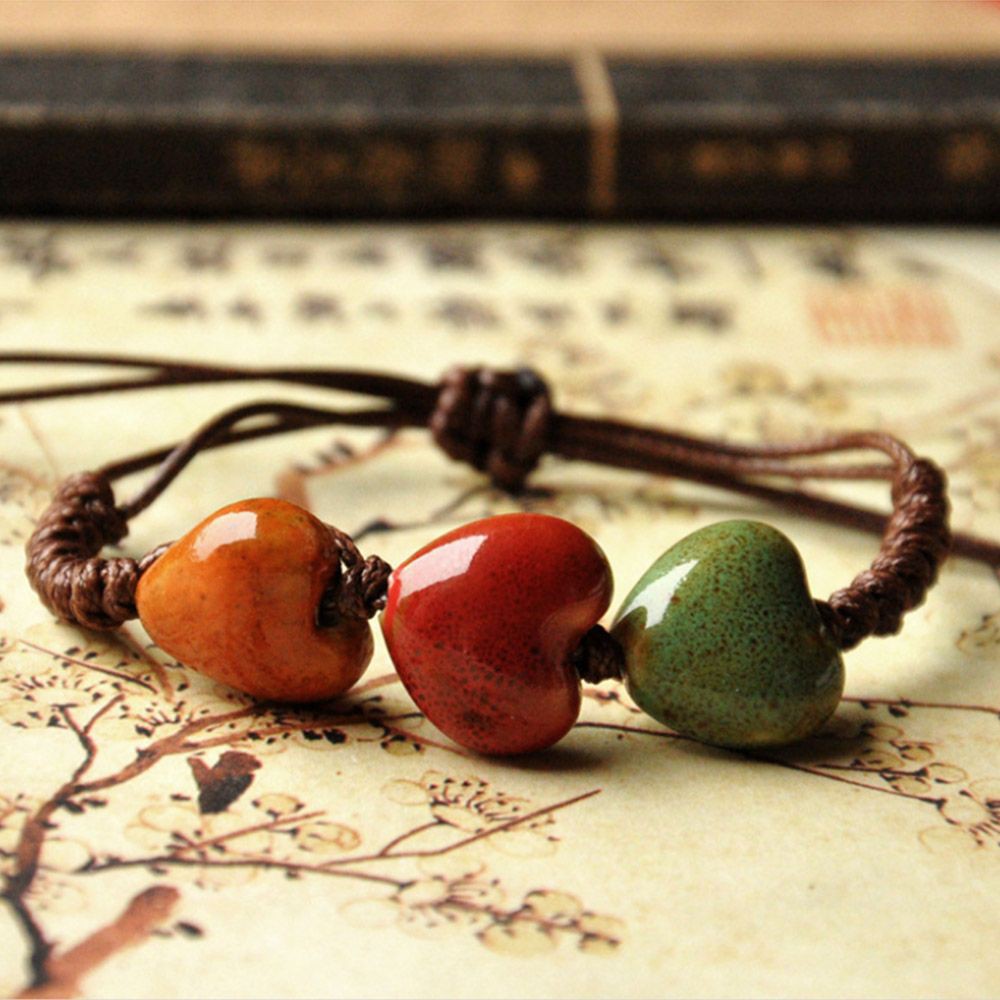 Vòng Đeo Tay Kết Hạt Sứ Hình Chiếc Lá Cho Nam Và Nữ