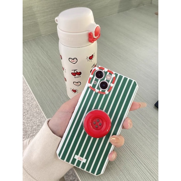 Ốp lưng noen mix cây thông, kẹo gậy và chiếc nút của Tiệm tạp hoá gần nha