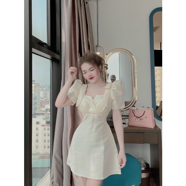 đầm nơ vai kem