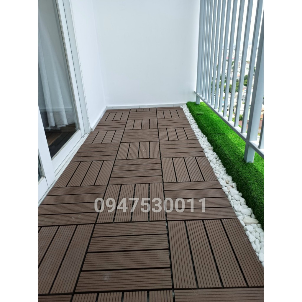 Vỉ Sàn Gỗ Nhựa Composite Lót Sàn Ban  Sân Vườn. Vỉ Gỗ Tràm Tự Nhiên. kích thước 30cm*30cm.Nhận thi công