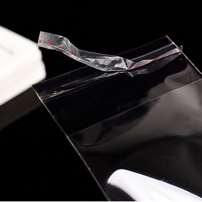 Set 100 túi tự dính và thẻ giấy màu trắng đựng trưng bày trang sức