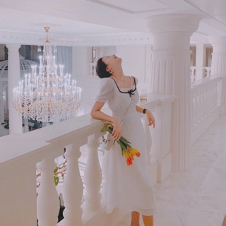 Đầm midi trắng nơ ngực