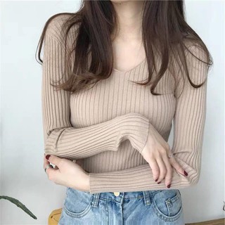 Áo len gân cổ tim