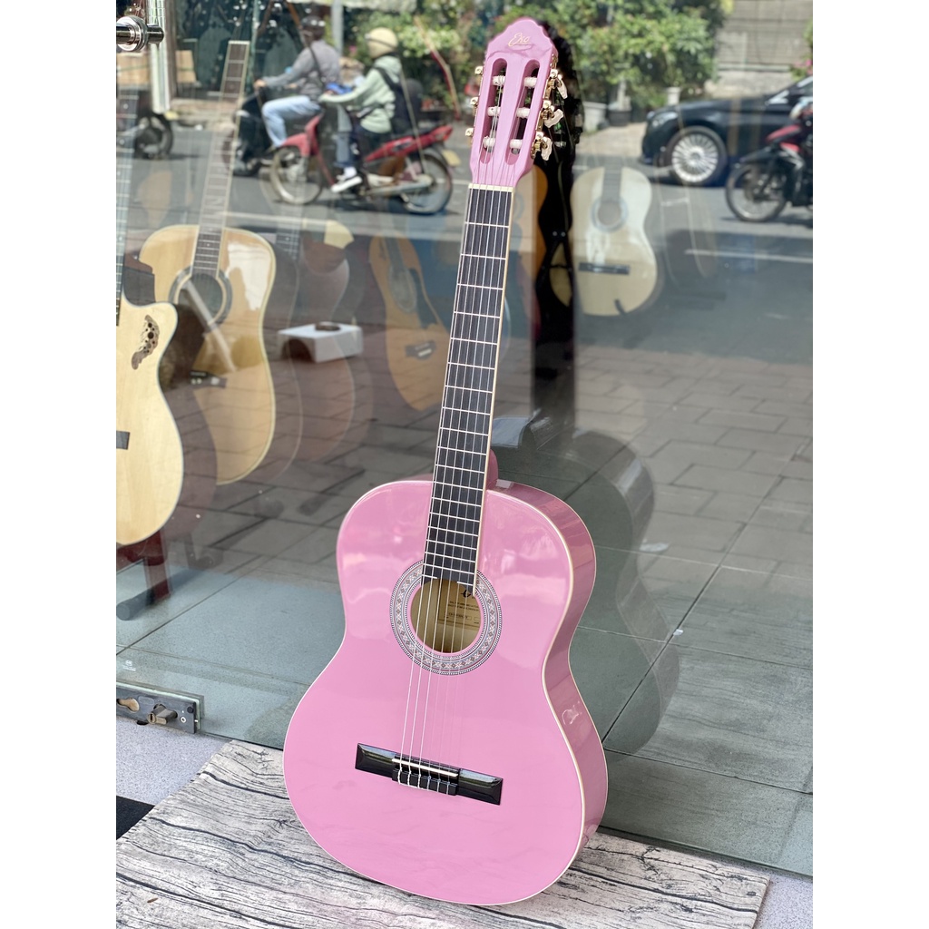 Guitar classic EKO CS10 màu hồng tím dáng tròn