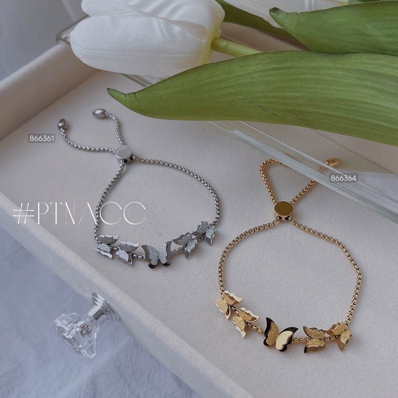 ᴾᵀᴺᵃᶜᶜ Lắc tay titan hồ điệp | L00.87274