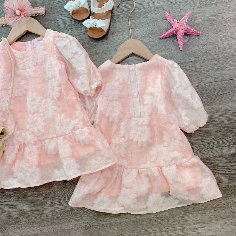 Váy gấm hoa nổi dành cho bé