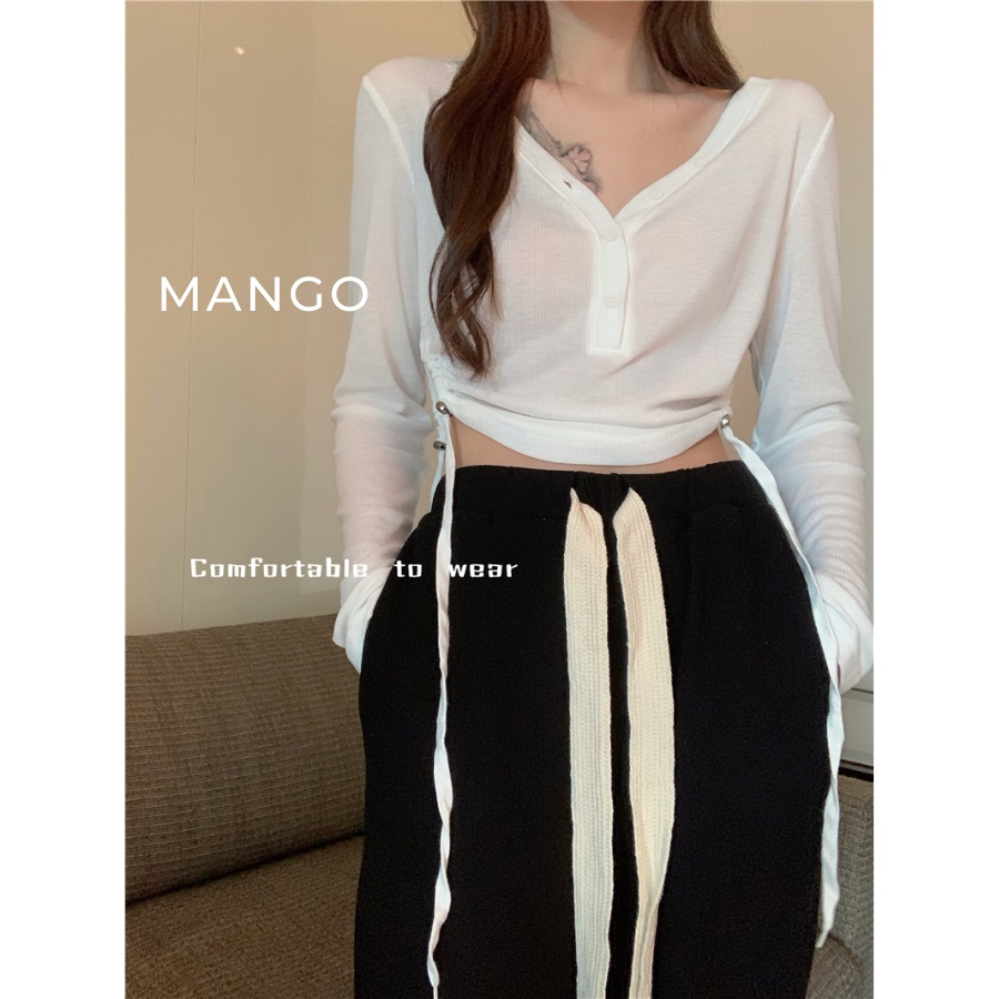 Quần suông ống rộng, lưng cao và kèm kiểu dây thừng dài